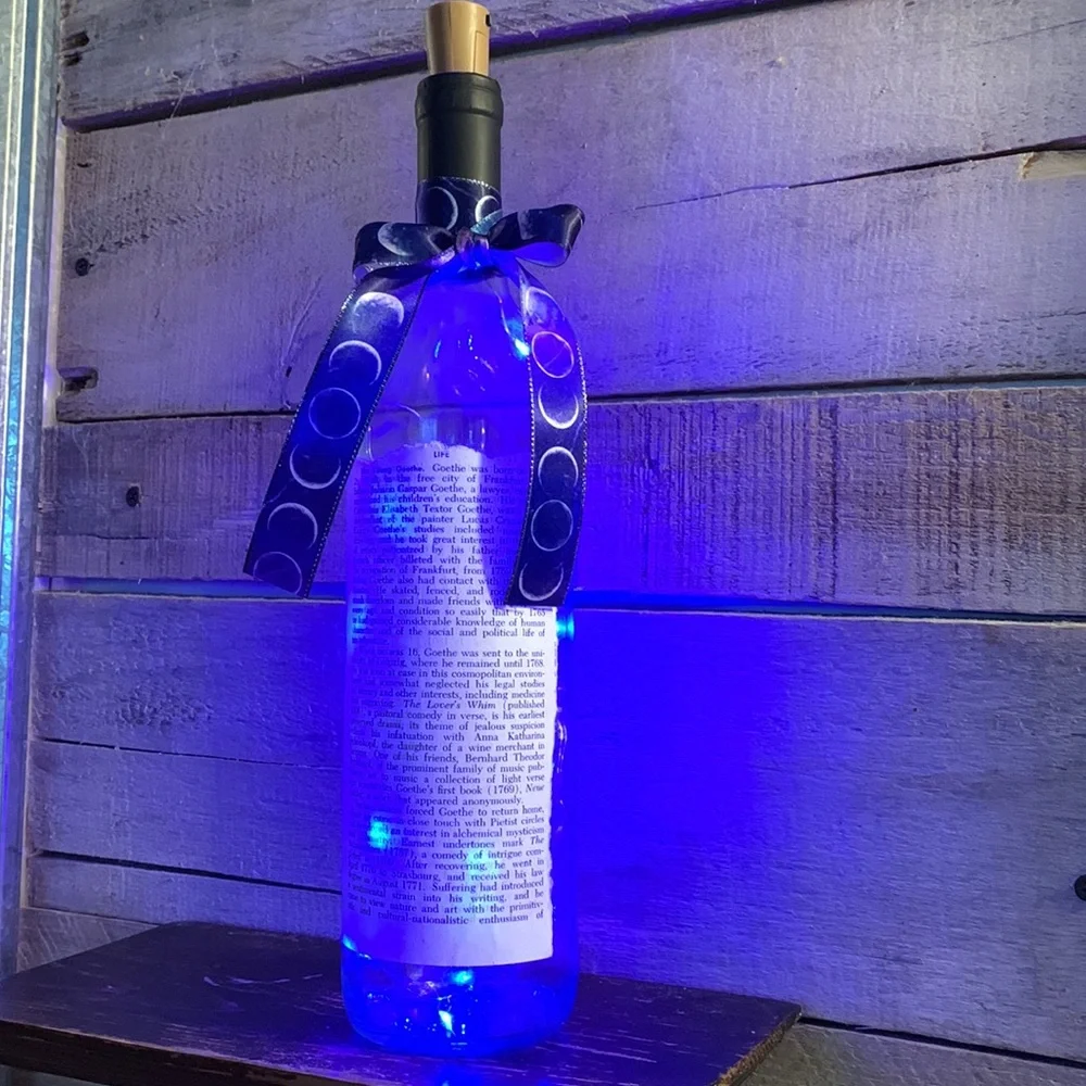 Handcrafted, upcycled decoupage bottle lantern Vintage encyclopedia Goethe page